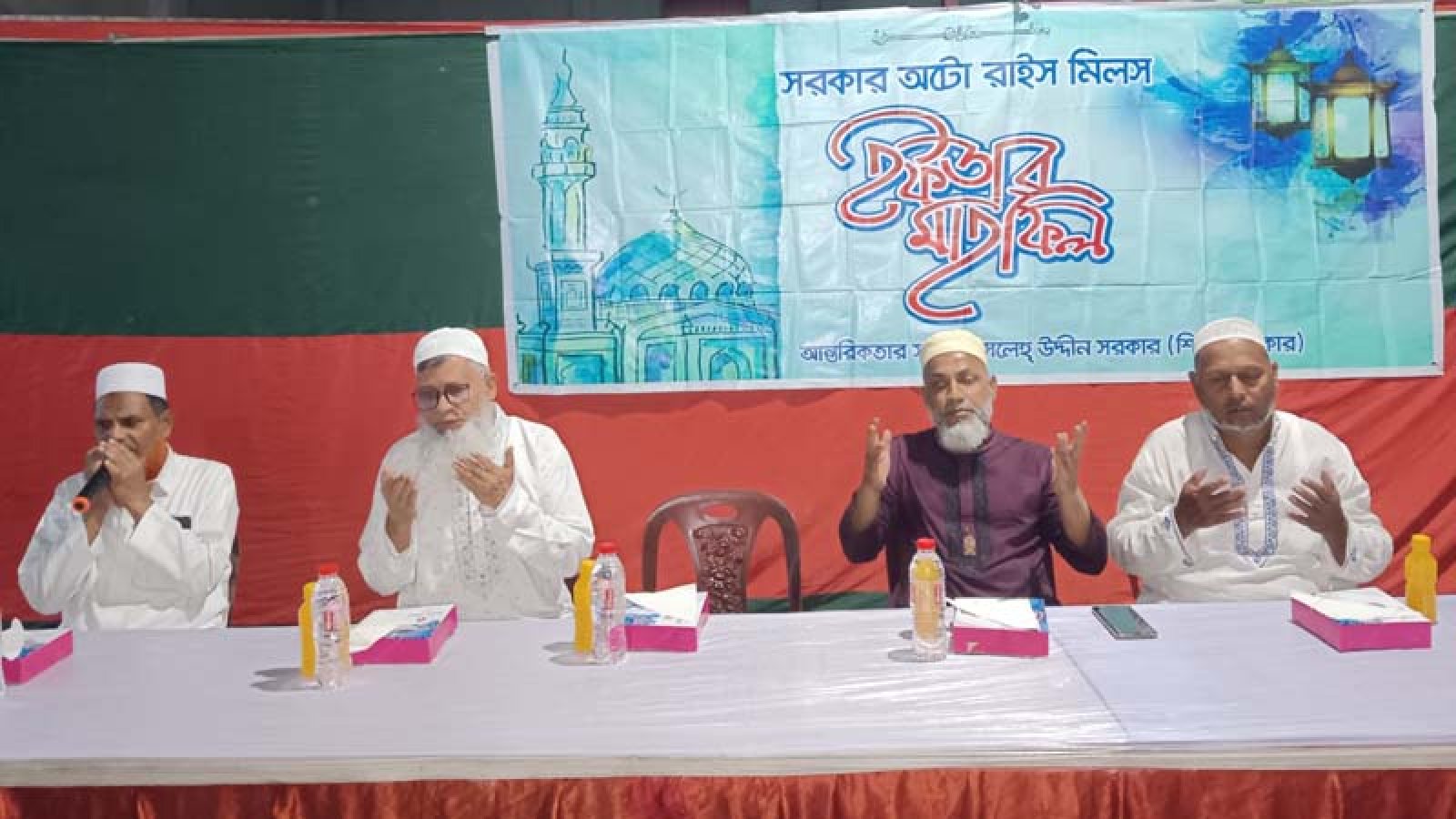 রহনপুরে সরকার অটো রাইস মিলে ইফতার মাহফিল