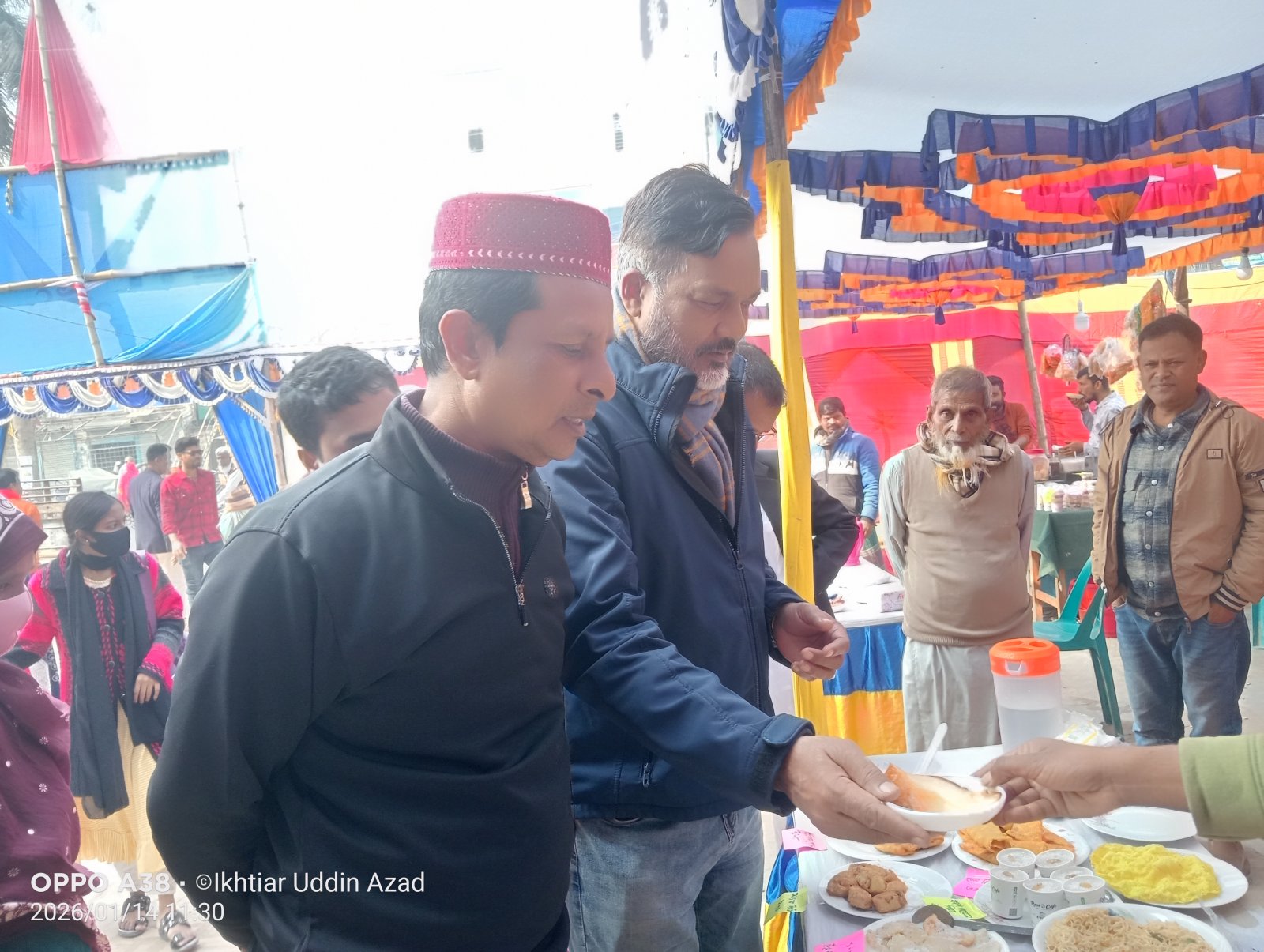 পত্নীতলায় সম্পীতির পিঠা উৎসব উদযাপন