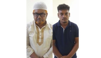 সান্তাহারে লাইসেন্সের নামে ভ্যান চালকদের কাছ থেকে চাঁদা আদায় আটক ২