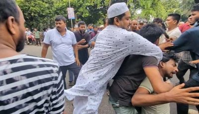 জামায়াত নেতাকর্মীদের বিরুদ্ধে ধানমন্ডিতে সাংবাদিক পেটানোর অভিযোগ